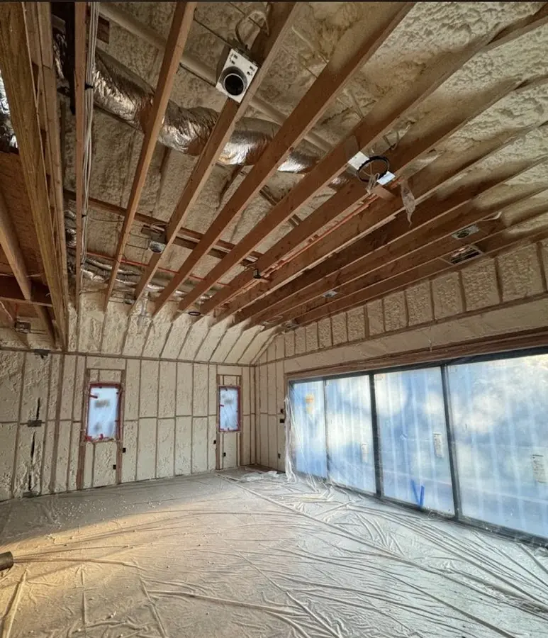Interior walls and ceiling insulated with spray foam during new construction in Lynchburg